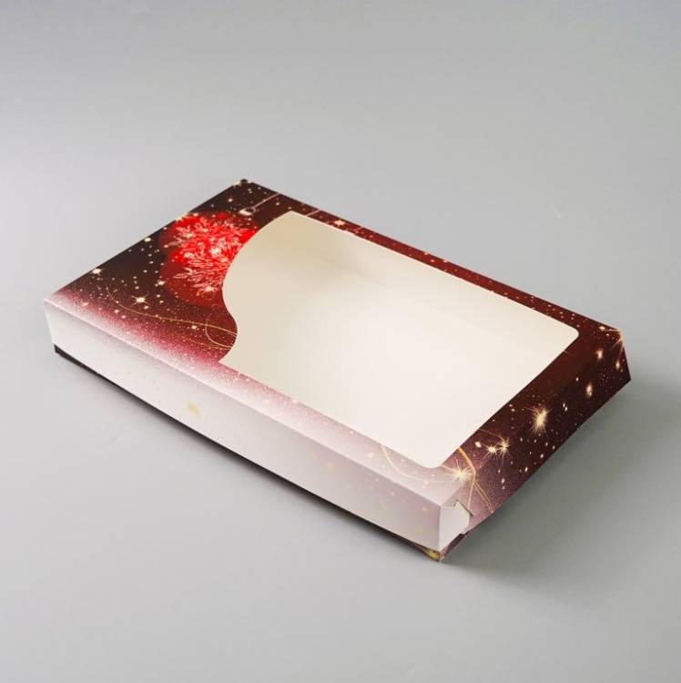 Obrázek k výrobku 26148 - Cake star vanočná krabica \"vianočná guľa\" červená veľká 36x22x5cm(1ks)