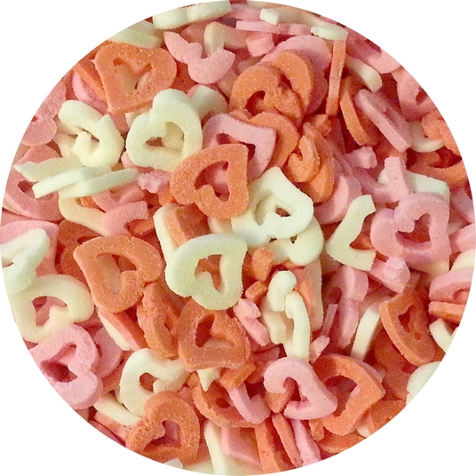 Obrázek k výrobku Cukrová srdíčka červená, růžová a bílá (50 g)