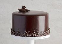 Detail k výrobkuEurocao Poleva lesklá Sacher s príchuťou horkej čokolády s lieskovými orieškami (250g)